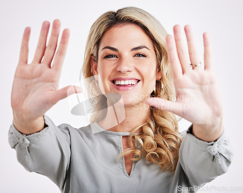 Image of Frame, hands and portrait of business woman on white background for ten sign, gesture and promotion. Happiness, smile and face of isolated female person with palms up, confidence and happy in studio