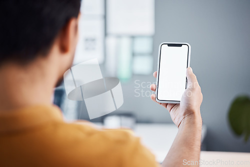 Image of Man, hands and phone with mockup screen for advertising, marketing or social media at the office. Hand of male employee holding mobile smartphone display for communication or app with copy space