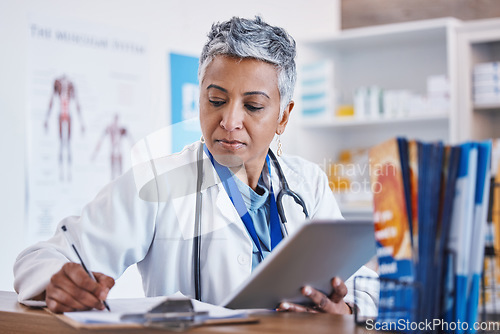 Image of Doctor, woman and tablet for writing healthcare notes on medical or medicine research in hospital. Professional female worker with technology for internet information, results or planning schedule