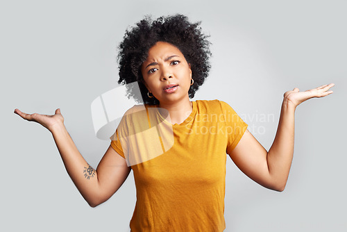Image of Confused, decision and portrait of African woman in studio with hand gesture for unsure, doubt and dont know. Thinking, what emoji and female person on white background for shrug, question and choice