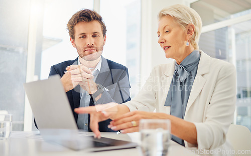 Image of Office laptop, business people and mentor explaining research data, online sales insight or company system. Teamwork, pointing gesture and senior woman working, teaching or coaching onboarding man