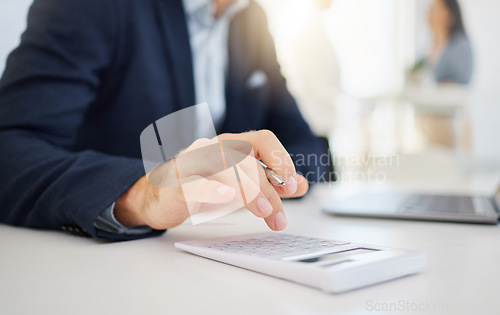 Image of Businessman, hands and calculator for finance, budget or expense in accounting or planning at office. Hand of male accountant working on financial plan, strategy or investment of corporate expenses