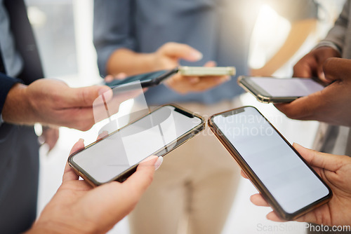 Image of Group, business people and blank phone screen for mockup space, mobile app and multimedia networking. Closeup hands of employees with smartphone technology, digital download and team sharing UI data