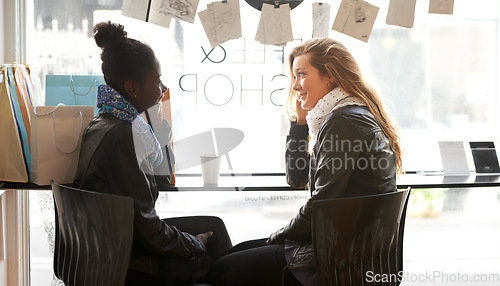 Image of Coffee shop, women or friends in cafe in conversation, gossip or fun communication together. Bonding, diversity or happy girls talking, speaking or drinking tea or espresso chatting in discussion