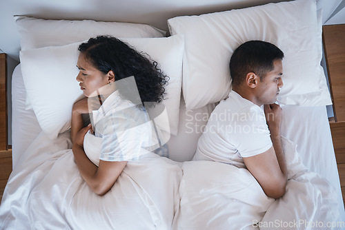 Image of Divorce, stress and angry couple in bed from above after fight, argue or relationship trouble. Depression, infertility and insomnia by woman and man ignoring marriage crisis, fail or snoring issue