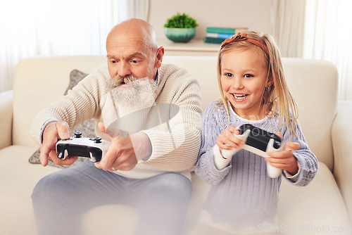 Image of Grandpa, child and playing or gaming for entertainment with console controller in fun bonding on sofa at home. Happy grandfather and kid enjoying game, leisure or free time in living room together