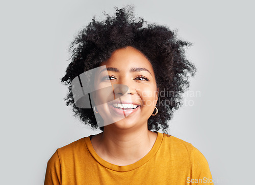 Image of Smile, woman and portrait in studio, white background and confident on backdrop. Face of happy young female model laughing with curly afro hair, positive personality and gen z style from South Africa