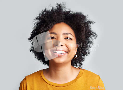 Image of Happy, woman and confident portrait in studio, white background and backdrop. Face of young female model, smile and natural curly afro hair with positive personality, gen z and girl of South Africa