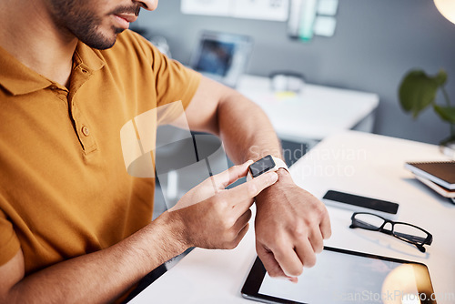 Image of Time, notification and man with a watch at work for deadline, appointment or reading a message. Digital, technology and an employee with electronics for timing, organizer and connection in office