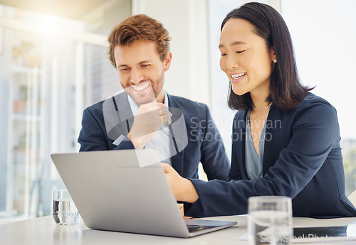 Image of Business man, woman and laptop for discussion, reading and planning with web research in office. Japanese businesswoman, businessman and computer for diversity, teamwork or collaboration at meeting