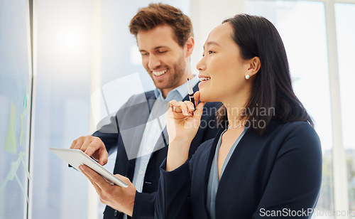 Image of Business man, woman and glass for planning notes or happy for brainstorming in office. Japanese businesswoman, businessman and tablet with diversity, moodboard and collaboration for strategy