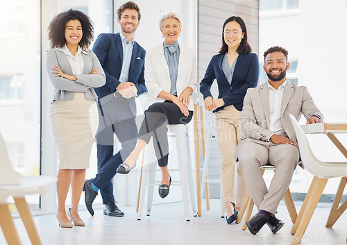 Image of Team, happy and portrait of business people in office for confidence, pride and goals on chairs. Professional, diversity and group of men and women smile for success, company mission and happiness
