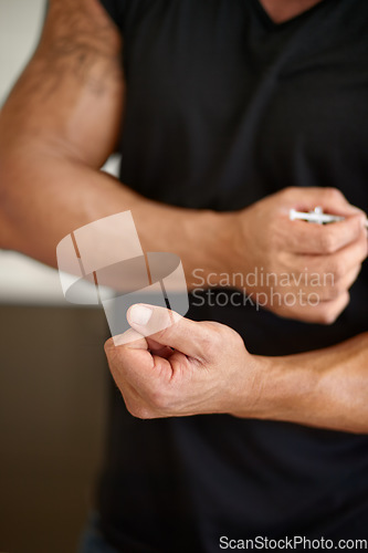 Image of Fitness, needle and muscle with arm of man for performance, testosterone and bodybuilder. Drugs, medicine and supplement with male athlete and illegal steroids injection hiding at home for hormones