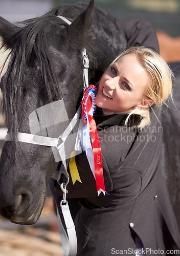 Image of Winner, sports and portrait of woman and horse for equestrian, competition and celebration. Happy, smile and animal show with female jockey and stallion with ribbon for achievement and performance