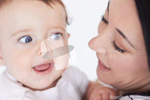 Image of Love, family and face of baby with mother for care, bonding and enjoy quality time together. Child development, youth growth and infant toddler with mom, mama or woman with single parents childcare