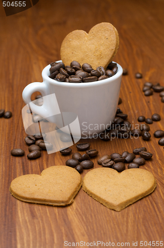 Image of Three Gingerbread Cookies in Coffee Beans