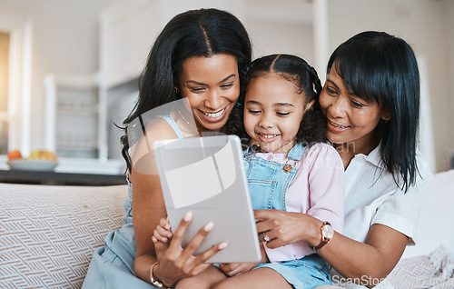 Image of Family, tablet and child on a children education app with mother and grandparent at home. Happiness, bonding and kid game on technology with a young girl smile from mom and grandmother help on couch