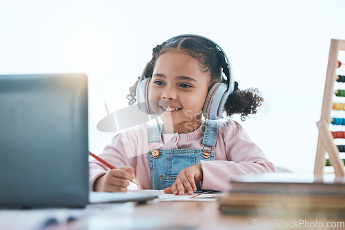 Image of Online education, laptop and headphones of child in e learning, language translation and writing in virtual class. Happy kid with audio technology, computer and English development or numbers at home