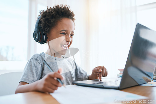 Image of Learning, laptop and headphones of child for online education, language translation and writing in virtual class. Happy african kid on audio tech, computer and web, streaming and development at home