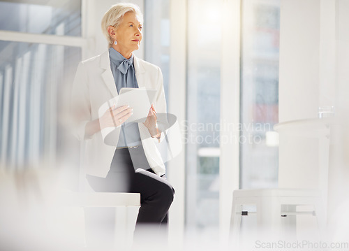 Image of Elderly business woman, tablet and thinking of company growth statistics, customer experience review or online data. Vision, office work and confident female person, director or boss sitting on desk