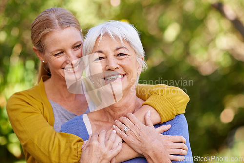 Image of Senior mother, woman and hug outdoor with happiness, love and care in portrait by trees on holiday. Elderly mama, lady and embrace with bond, excited face and support in backyard with summer sunshine