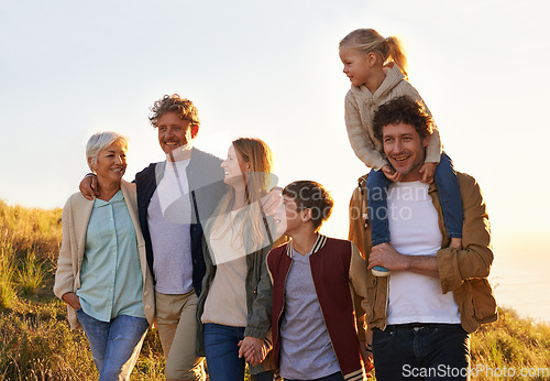 Image of Love, countryside and family bonding, smile and quality time with happiness, walking and relax. Grandparents, mother and happy father carry daughter, siblings and loving outdoor, break and adventure