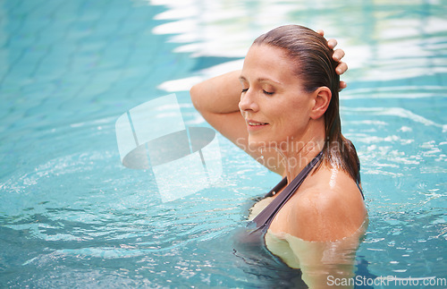 Image of Fitness, exercise and senior woman in a swimming pool, happiness and stress relief with fun. Human, mature female person and lady with joy, training and relax with water sports, workout and chilling