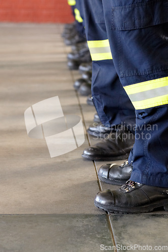 Image of Fireman service, legs and team of firefighter ready for emergency services, disaster prevention or fire fighting. Shoes, safety security and row of people, men or firemen group standing at attention