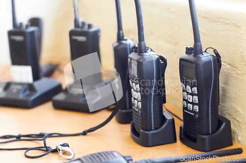 Image of Charge, radio and walkie talkie for communication, equipment and battery with connection. Technology, tools and receiver with transmitter, portable and security with protection, energy and network