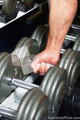 Image of Hands, arm dumbbell workout and man doing power exercise, club fitness or bodybuilding training. Wellness health, strong and body builder, muscular person or male athlete working on gym challenge