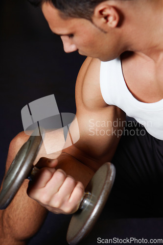 Image of Arm muscle, dumbbell or strong fitness man doing bicep workout, gym performance routine or strength training. Motivation, focus or muscular bodybuilder, athlete or active person doing dumbell curling