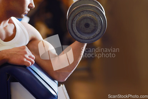 Image of Arm strength, dumbbell and man with training routine, athlete determination or focus on power, health or club challenge. Determined, healthy fitness and ripped person workout for strong bicep growth