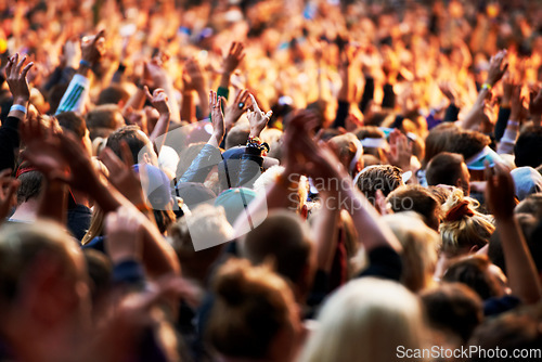 Image of Dance, music and party with crowd at festival for concert, dj show and rave performance. Rock, energy and hands of people dancing in audience for celebration, disco and techno event