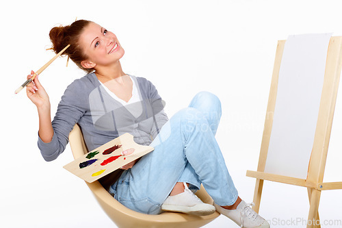 Image of Happy woman, painting and thinking of art canvas project in studio with talent and paint brush for color. Artist or painter person isolated on a white background for creative work and mockup idea