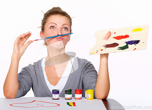 Image of Silly woman, painting and art in studio for creativity and talent with paint brush for color. Female artist or painter with funny moustache isolated on a white background for creative drawing