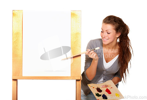 Image of Art, woman painter and canvas in studio for creativity, talent and paint brush for color. Female artist happy about painting isolated on a white background for creative work, project and mockup space