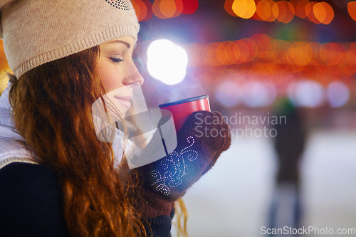 Image of Woman, ice rink and happy in night with coffee, steam or smell aroma on winter vacation. Girl, happiness or warm drink for cup of matcha, espresso or latte for energy for exercise, fitness or holiday