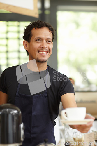 Image of Coffee shop, barista and a man serving cup as small business, restaurant or startup owner. Smile of a happy entrepreneur man working as a waiter or manager with a drink or tea in a cafeteria or cafe