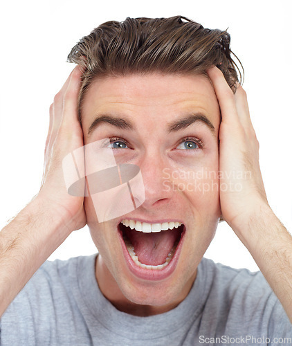 Image of Excited, face and man closeup in a studio with happiness from deal and announcement with smile. Isolated, white background and male person happy and shouting from good news, winning and surprise