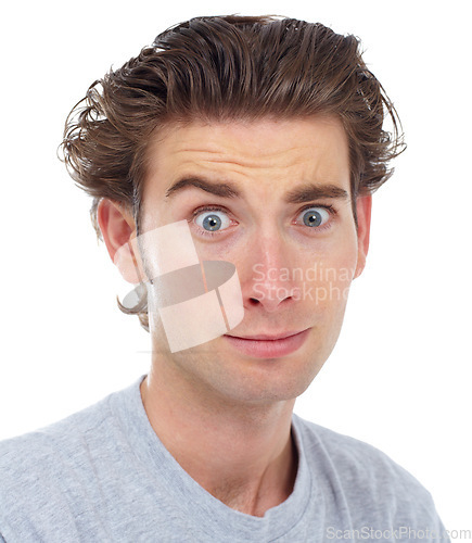 Image of Surprise, suspicious and portrait of a man in a studio with a raised eyebrow and shocked face expression. Curious, confused and male model with a wtf surprised face isolated by a white background.