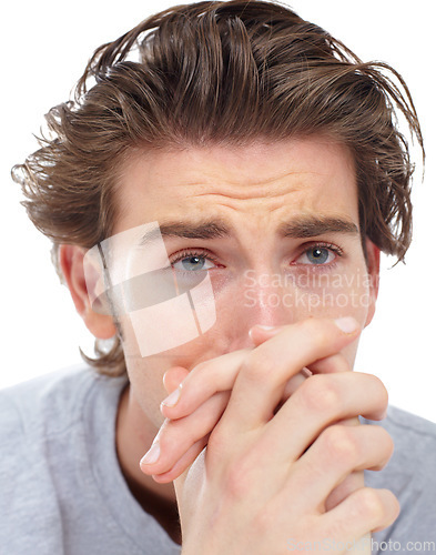 Image of Man, depressed crying and hands in studio with mental health problem, lost and frustrated by white background. Male model, sad student and anxiety with tears, depression and thinking with stress