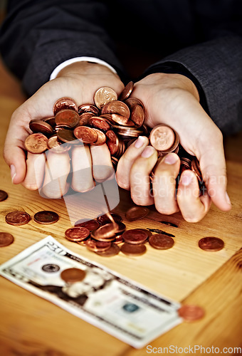 Image of Cupped hands, coins and saving cash for investing, planning and personal finance goal in office. Financial advisor, holding money or currency for banking, investment or building wealth at workplace