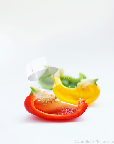 Image of Vegetables or fruits, bell peppers and in studio or white background. Closeup nutrition or diet, vegetarian and salad meal with different colors for health or food commercial or advertisement