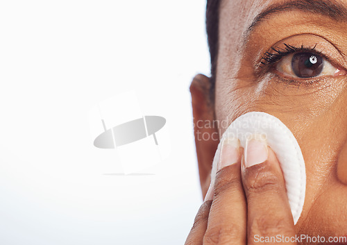 Image of Portrait, mockup or woman with cotton pad for facial dermatology, skincare or healthy shine. White background, studio space or face of person cleaning with swab for beauty, cleansing or dirt removal