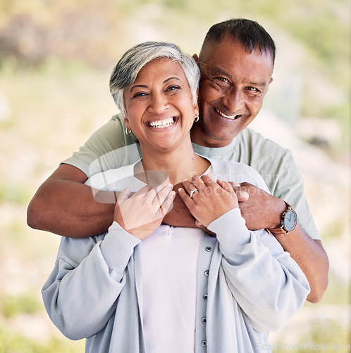 Image of Senior couple, hug and happy portrait together in nature and love in marriage with support or garden in nursing home. Lovers, embrace and elderly people relax with happiness and smile in retirement