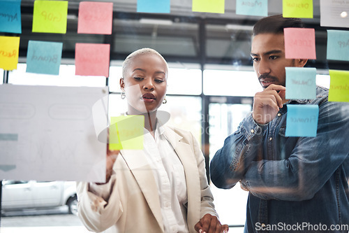 Image of Creative people, team and thinking in planning for schedule brainstorming or meeting at office. Man and woman in teamwork decision for project plan, tasks or sticky note ideas in startup at workplace