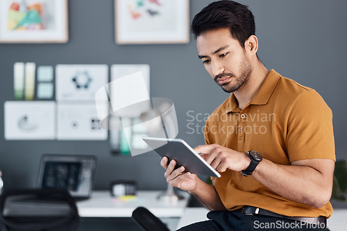 Image of Tablet, focus and man typing digital illustration, graphic design sketch or online advertising typography. Creativity, agency and serious person working on project, app development or brand promotion