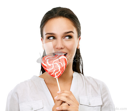 Image of Happy, candy and woman with a lollipop for a sweets craving, dessert or sugar. Happiness, snack and young female model eating a heart shape sweet while isolated on a transparent png background