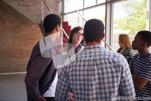 Image of Catching up between their breaks. Cropped shot of a group of university students hanging out between class.