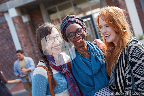 Image of Friends make student life all the more fun. Portrait of a group of university students on campus.